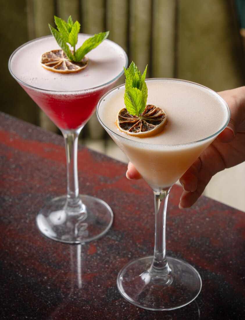 Pink cocktails in coupe glasses